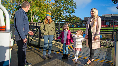Kids with Moms arriving at Killaloe River Cruise